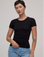 Alex is 5'8" and wearing P Baby Tee in Basic Black