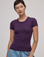 Alex is 5'8" and wearing P Baby Tee in Nebula Purple