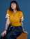 Sydney is wearing Painted Burly Tee in Mustard Yellow