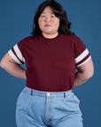 Ashley is 5’7” and wearing L Painted Vintage Tee in Red Wine