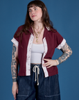 Sydney is 5’9” and wearing XXS Painted Pantry Button-Up in Red Wine