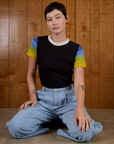 Alex is 5'8" and wearing P Calypso Tee in Black Multi