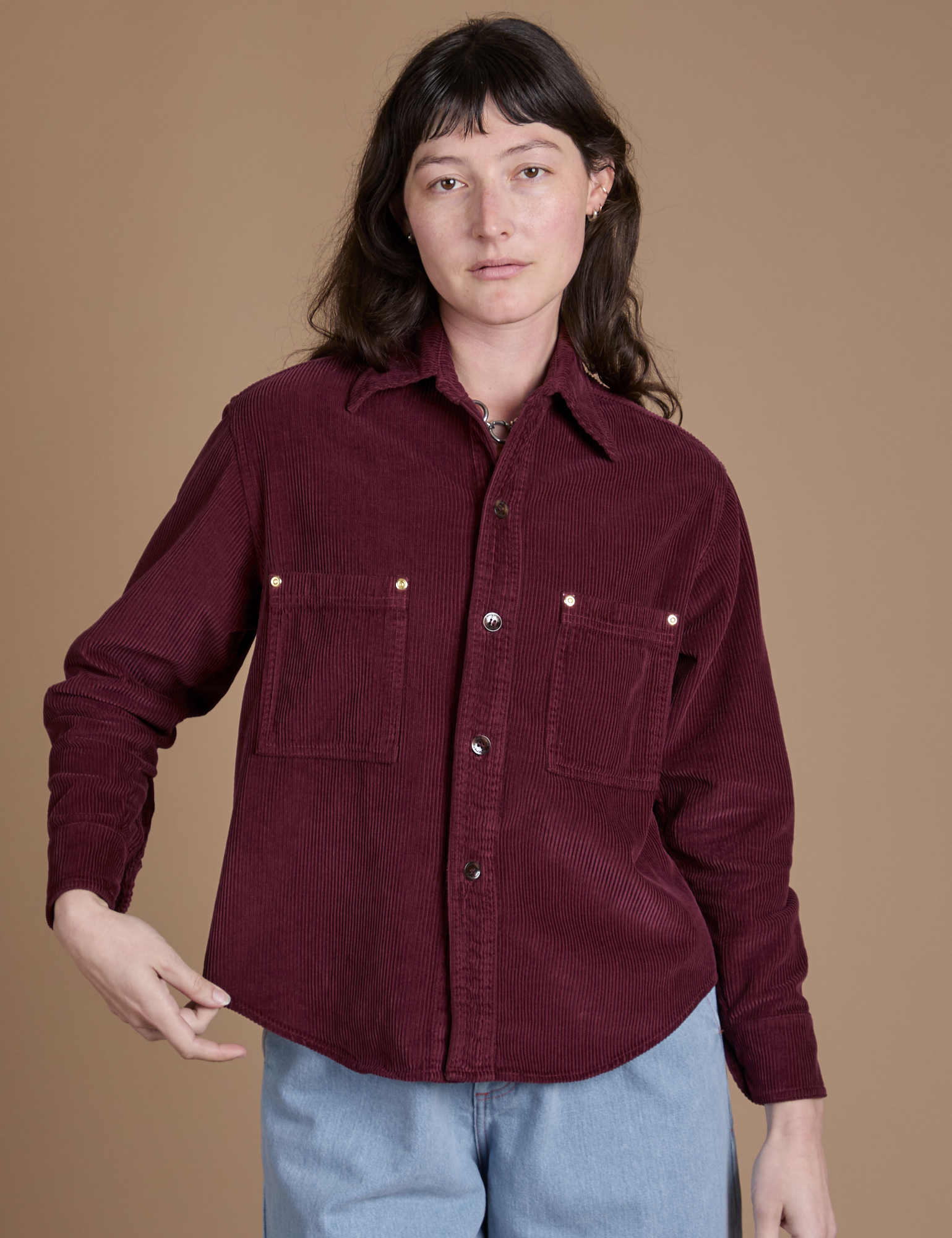 Alex is 5'8" and wearing P Cropped Corduroy Overshirt in Red Wine