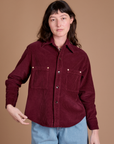 Alex is 5'8" and wearing P Cropped Corduroy Overshirt in Red Wine
