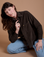 Alex is 5'8" and wearing P Cropped Corduroy Overshirt in Espresso Brown