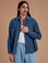 Anthony is 5'6" and wearing S Cropped Corduroy Overshirt in French Blue
