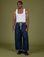 Isaac is 5’10” and wearing M Denim Drop Pocket Pants in Dark Wash paired with vintage tee white Cropped Tank