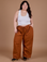 Ashley is 5'7" and wearing 1XL Drop Pocket Cargo Pants in Burnt Terracotta
