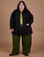 Sam is 5'10" and wearing 2XL Ripstop Field Coat in Basic Black paired with evergreen Drop Pocket Cargo Pants