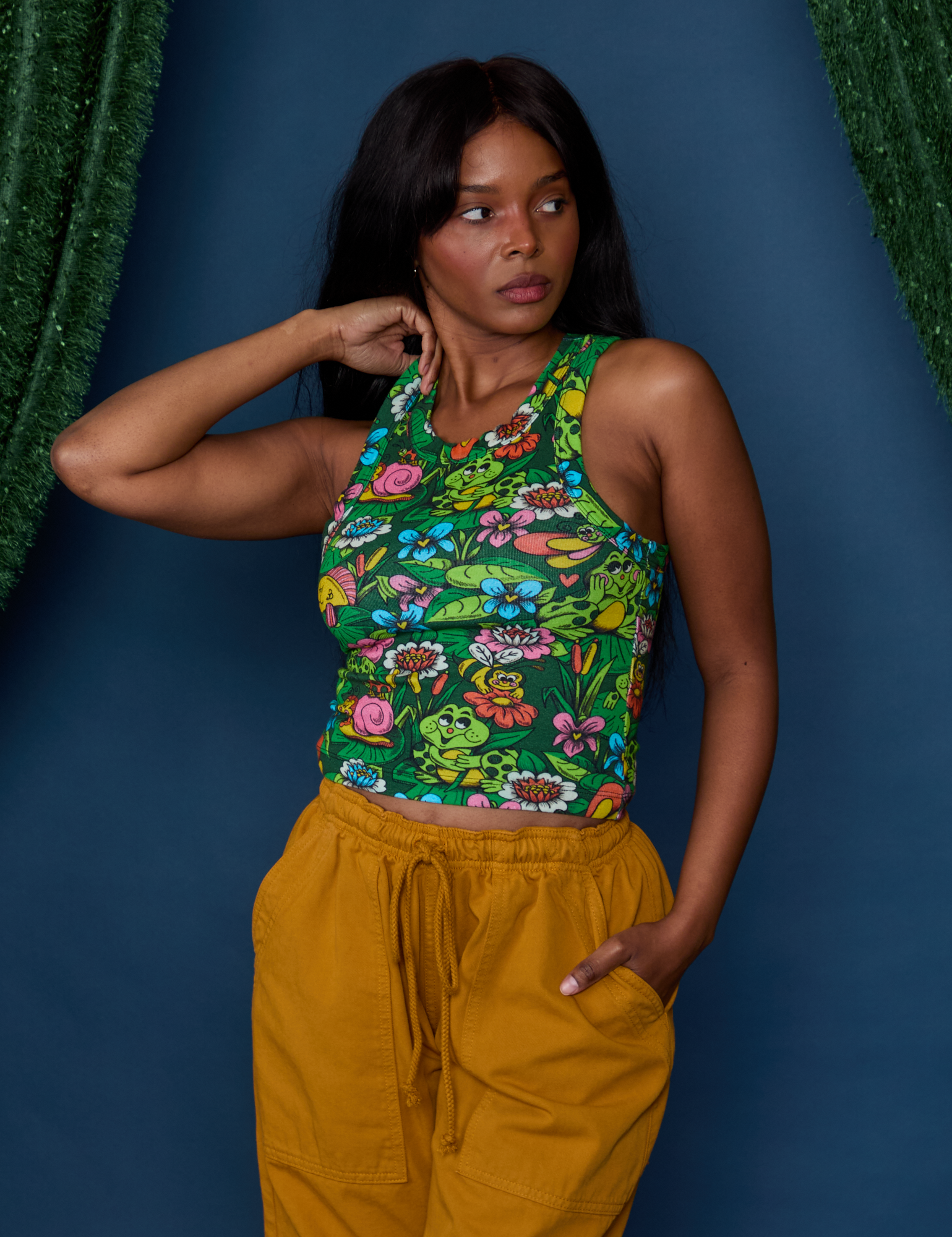 Kandia is 5'3" and wearing P Pond Party Racerback Tank 