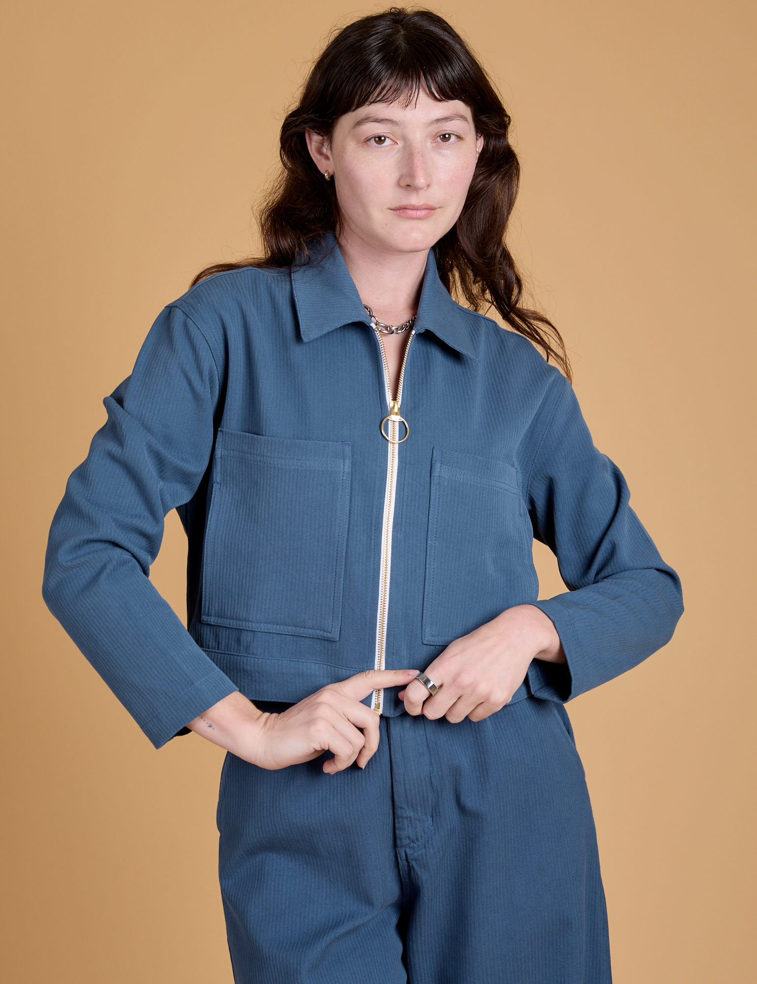 Alex is 5’8” and wearing P Heritage Mechanic Jacket in French Blue