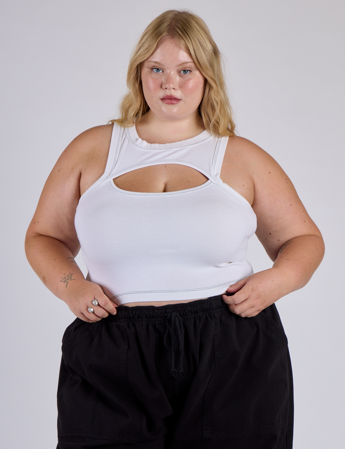 Juliet is 5’7” and wearing L Porthole Tank in Vintage Tee White