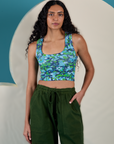 Shahana is 5’10 and wearing P Cropped Tank Top in Angel Print