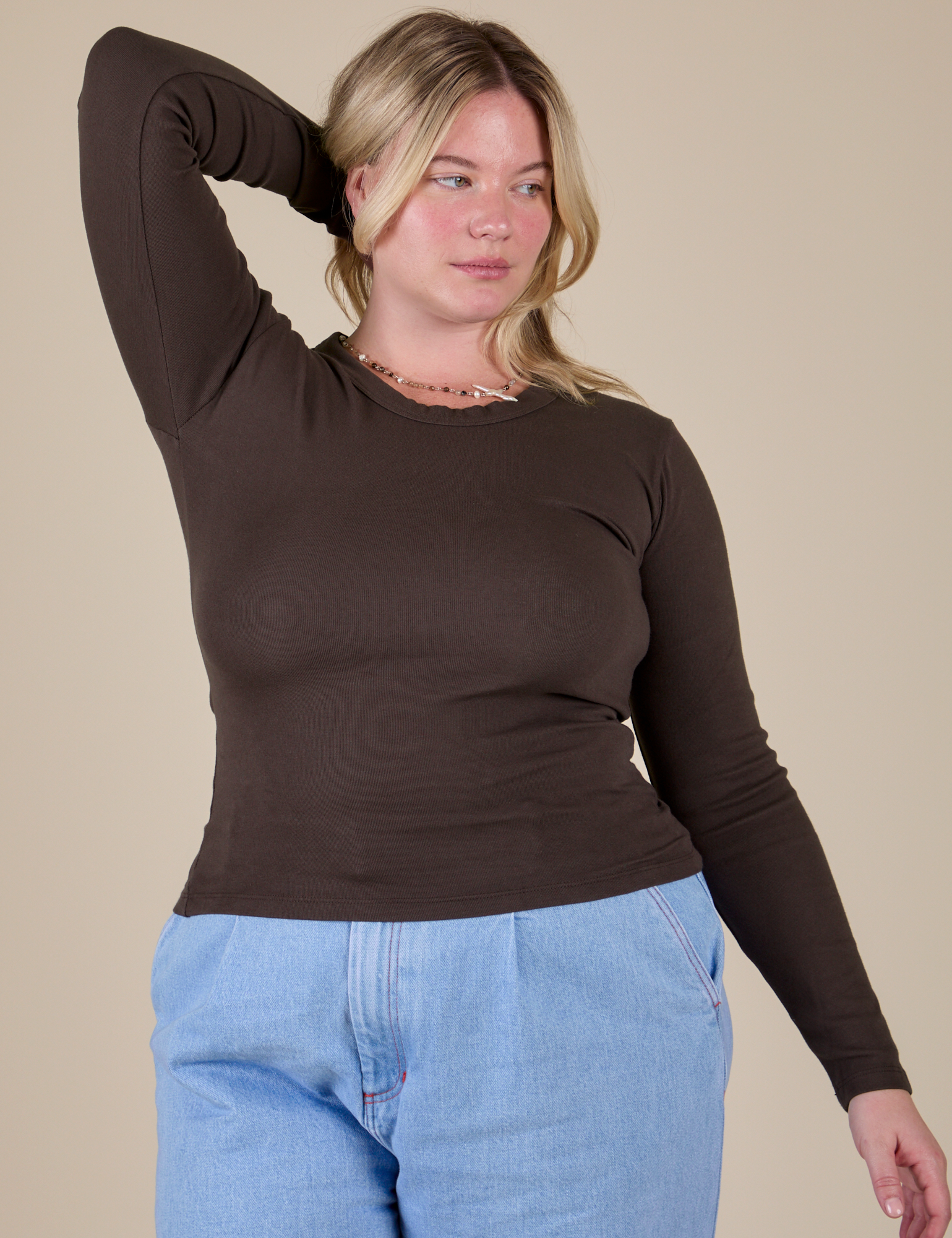 Lish is 5’8” and wearing XS Long Sleeve Baby Tee in Espresso Brown