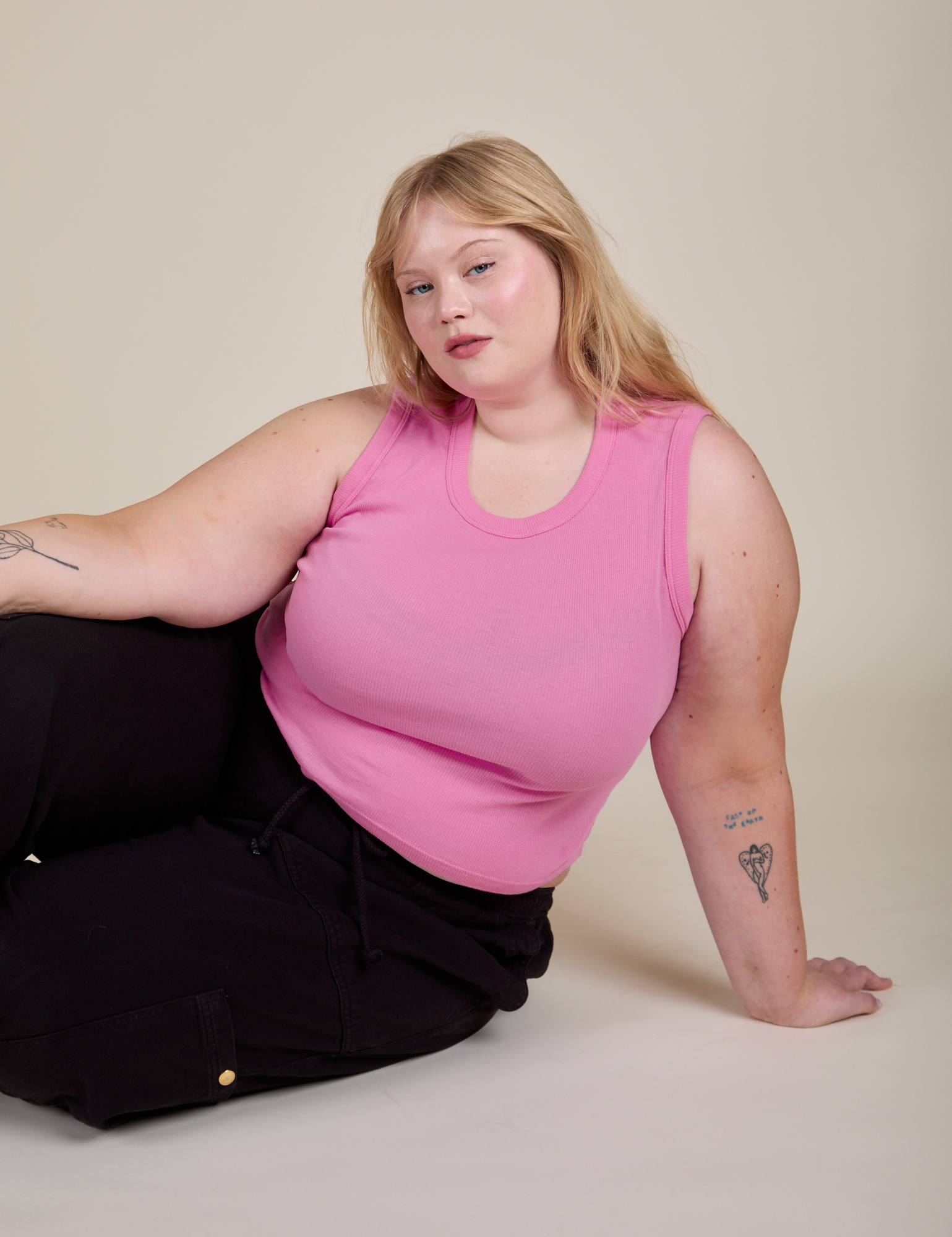 Juliet is wearing Muscle Tee in Bubblegum Pink