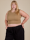 Juliet is 5’7” and wearing M Muscle Tee in Desert Brown