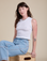 Alex is 5’8” and wearing P Muscle Tee in Vintage Tee White