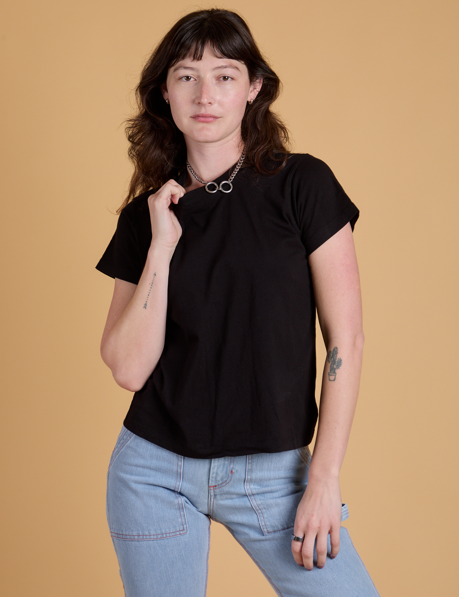 Alex is 5’8” and wearing P Organic Vintage Tee in Basic Black