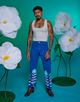 Jesse is 5'8" and wearing XS Paintstamped Work Pants in Daisy paired with a Cropped Tank in Vintage Tee White