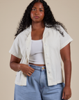 Meghna is 5’8” and wearing M Pantry Button-Up in Vintage Tee White