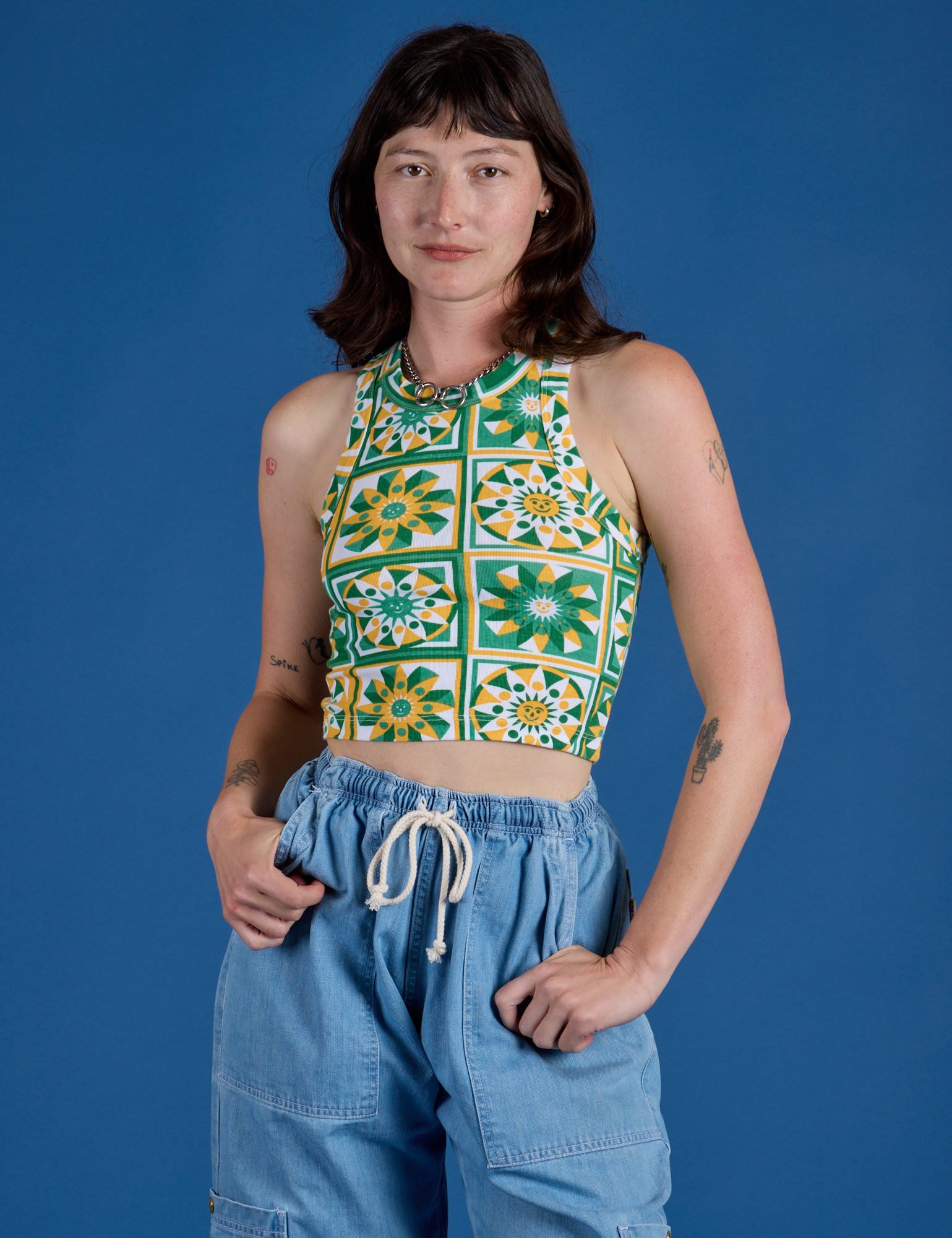 Alex is 5’8” and wearing P Deep-Cut Racerback Tank in Spring Quilt Print