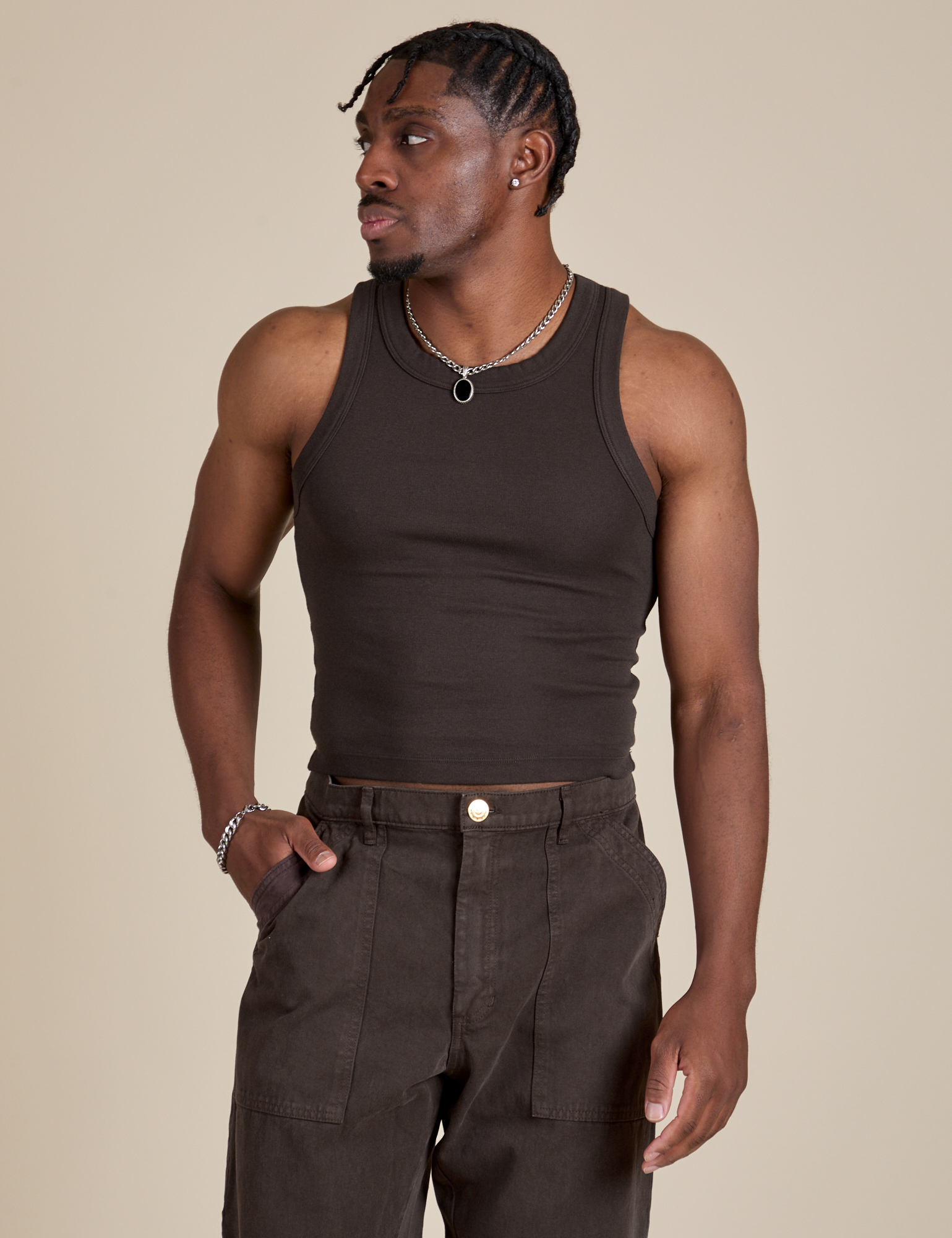 Isaac is 5’10” and wearing S Racerback Tank in Espresso Brown