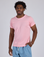 Isaac is 5’10” and wearing M Jr. Varsity Tee in Baby Pink