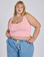 Juliet is 5’7” and wearing L Cropped Tank Top in Baby Pink