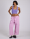 Kira is 5’10” and wearing XS Drop Pocket Cargo Pants in Lilac Purple paired with faded grape Cropped Tank
