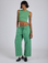 Kira is 5’10” and wearing XS Drop Pocket Cargo Pants in Seafoam Green paired with matching muscle tee
