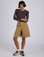Kira is 5’10” and wearing XS Longline Work Shorts in Desert Brown paired with espresso Long Sleeve Baby Tee