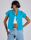Kira is 5’10” and wearing P Pantry Button-Up in Hawaiian Blue