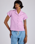 Kira is 5’10” and wearing P Pantry Button-Up in Lilac Purple