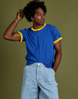 Jerrod is 6’3” and wearing M Vintage Ringer Tee in Royal Blue