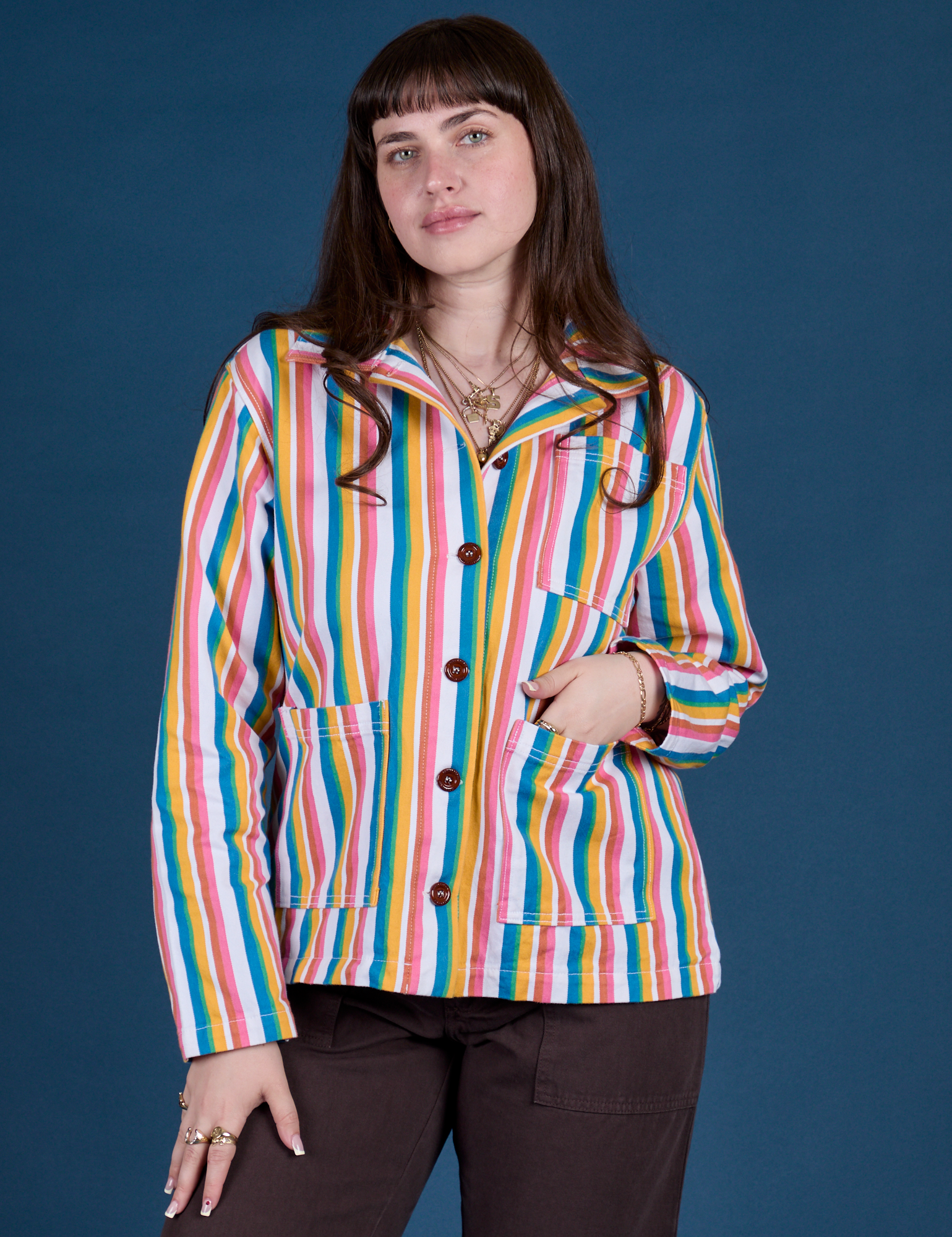 Sydney is 5’9” and wearing XS Stripe Work Jacket in Rainbow Stripe