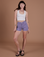 Alex is 5’8” and wearing XXS Classic Work Shorts in Faded Grape paired with a Cropped Tank Top in Vintage Tee White