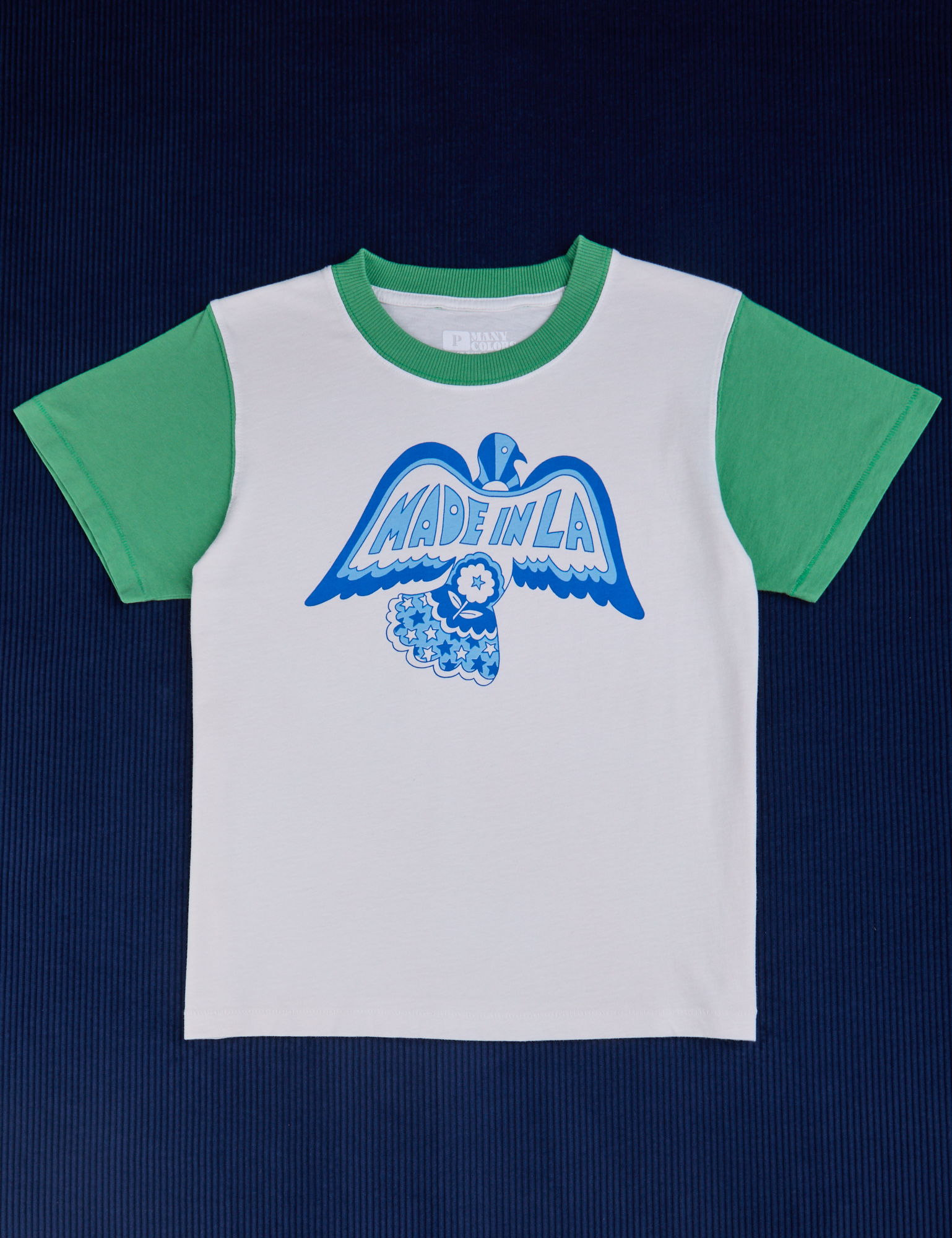 Made in LA Benefit Tee with a blue dove in the middle of the shirt