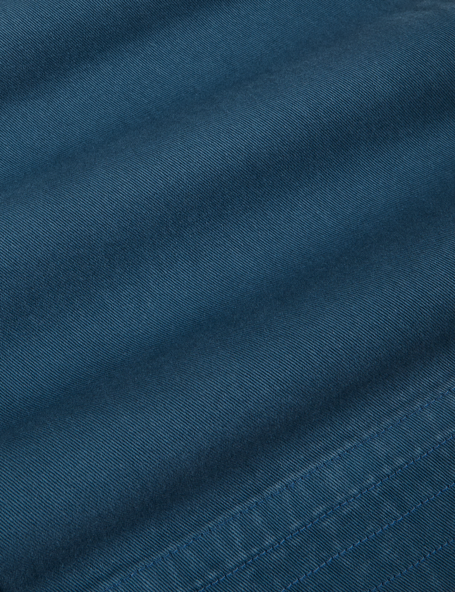 Action Pants in Lagoon fabric detail close up