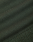 Action Pants in Swamp Green fabric detail close up