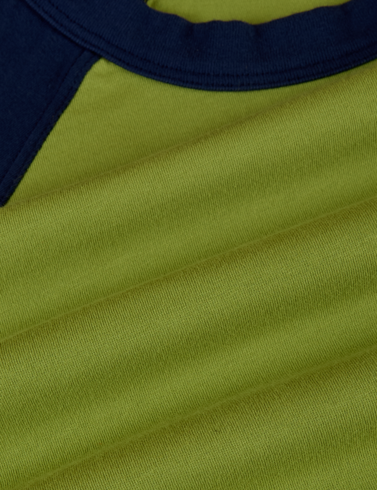 Fabric close up of the Gross Green/Navy Colorblock Raglan Tee
