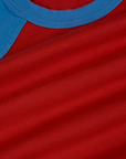 Fabric close up of the Mustang Red/Blue Colorblock Raglan Tee