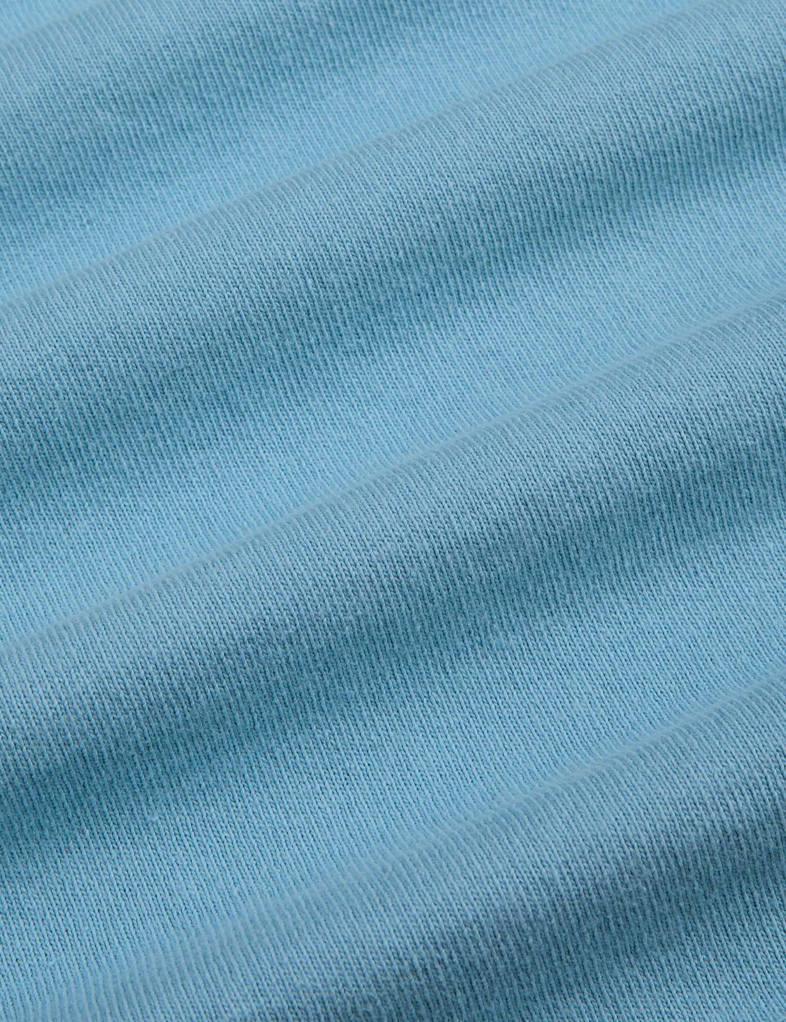 Painted Burly Tee in Baby Blue fabric detail close up