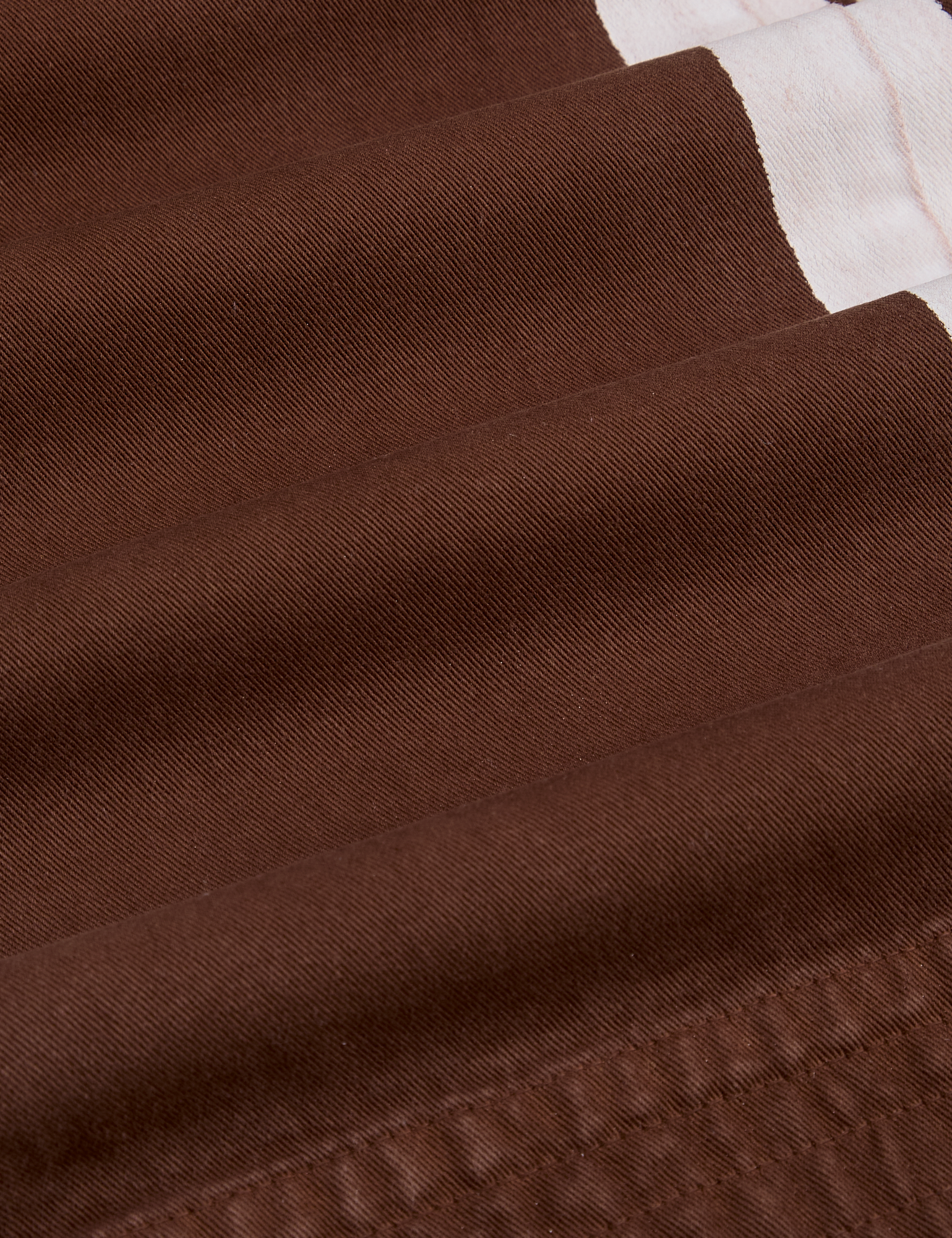 Painted Action Pants in Fudgesicle Brown fabric detail close up