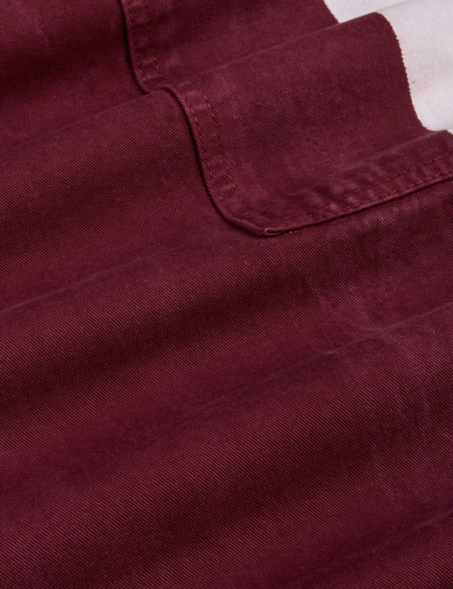 Painted Drop Pocket Cargo Pants in Red Wine fabric detail close up
