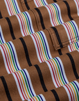 Striped Drop Pocket Pants in Retro Rainbow fabric close up. Black, white, red, orange, yellow, green and blue stripes