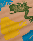 Paintstamped Work Pants in Froggy
fabric detail close up. Paintstamped green, blue and yellow frogs