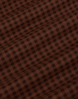 Gingham Long Sleeve Baby Tee in Fudgesicle Brown fabric detail close up