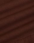 Pleated Trouser Shorts in Fudgesicle Brown fabric detail close up