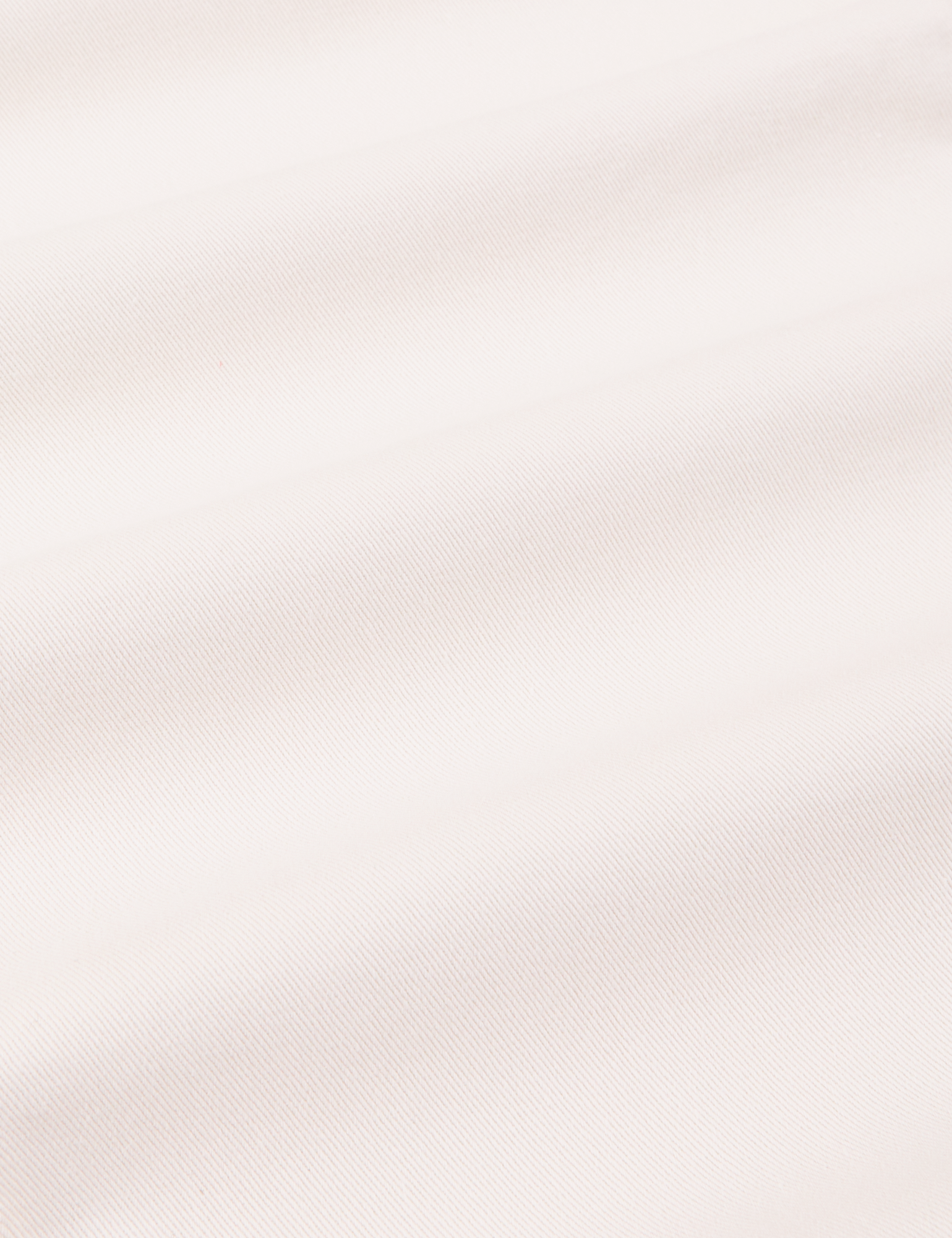 Heavyweight Trousers in Vintage Tee Off-White fabric detail close up.