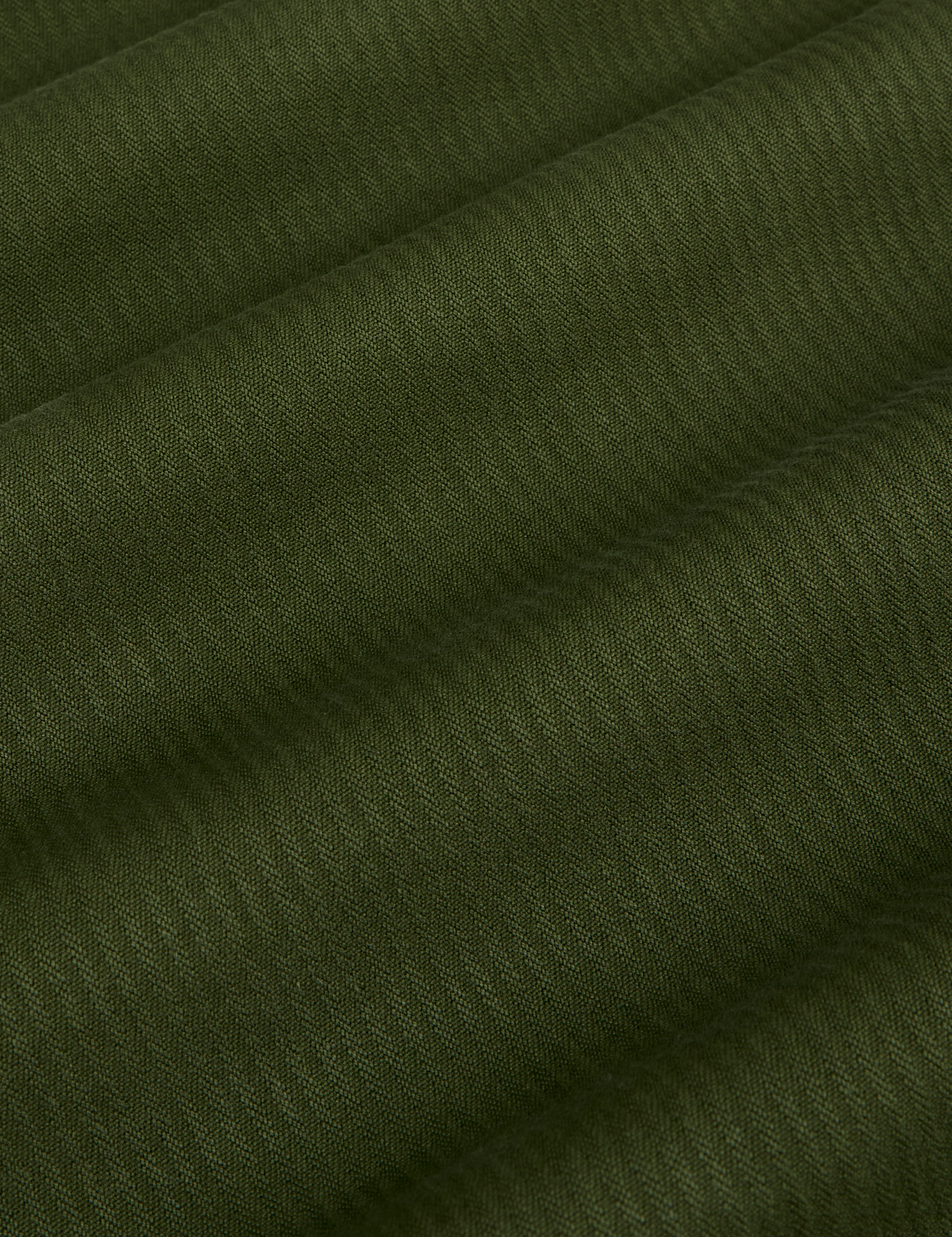 Heritage Wide Leg Trousers in Evergreen fabric detail close up